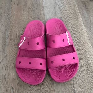 Crocs. Sandals. Fuchsia